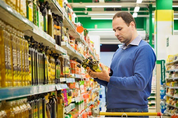 Man inspecting Packaging and Labelling